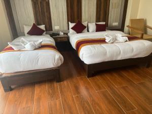 Katil atau katil-katil dalam bilik di Hotel Murano