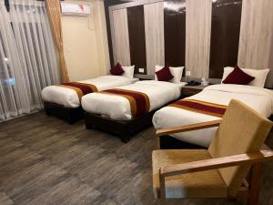 Katil atau katil-katil dalam bilik di Hotel Murano