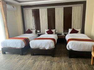 Katil atau katil-katil dalam bilik di Hotel Murano