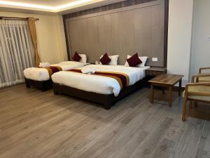 Katil atau katil-katil dalam bilik di Hotel Murano