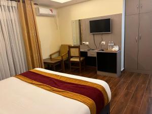 Katil atau katil-katil dalam bilik di Hotel Murano