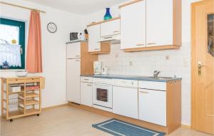 Kuchyň nebo kuchyňský kout v ubytování Ferienwohnung Mit Gebietspano,