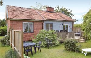 a small house with a table and chairs at Beautiful Home In Kristianstad With Wifi in Kristianstad