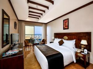 Postel nebo postele na pokoji v ubytování Hôtel Club Val d'Anfa Casablanca Ocean view