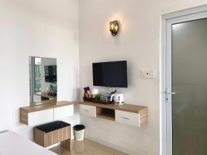 TV a/nebo společenská místnost v ubytování Homestay Tulip Garden Bảo Lộc