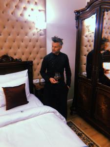 Postel nebo postele na pokoji v ubytování Picasso Boutique Hotel