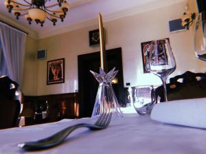 Postel nebo postele na pokoji v ubytování Picasso Boutique Hotel