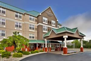 una representación de un hotel con una entrada cerrada en Country Inn & Suites by Radisson, Louisville East, KY, en Louisville