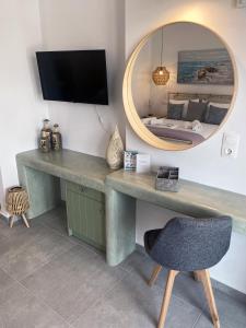 TV a/nebo společenská místnost v ubytování Xenios Zeus Apartments