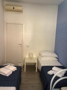 Ein Bett oder Betten in einem Zimmer der Unterkunft Casa Vacanze BIANCA