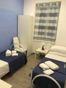 Postel nebo postele na pokoji v ubytování Casa Vacanze BIANCA
