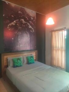 מיטה או מיטות בחדר ב-Dragonfly Hostel and Homestay