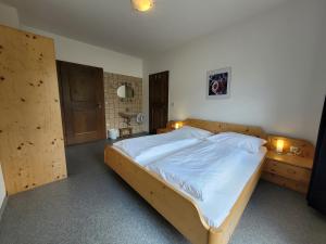 Postel nebo postele na pokoji v ubytování Profelt`s Apartments Uttendorf - Steinbock Lodges
