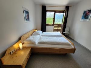 Postel nebo postele na pokoji v ubytování Profelt`s Apartments Uttendorf - Steinbock Lodges