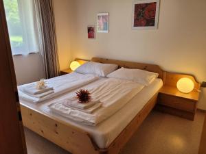 Posteľ alebo postele v izbe v ubytovaní Profelt`s Apartments Uttendorf - Steinbock Lodges