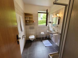 Koupelna v ubytování Profelt`s Apartments Uttendorf - Steinbock Lodges