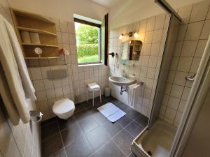 Koupelna v ubytování Profelt`s Apartments Uttendorf - Steinbock Lodges