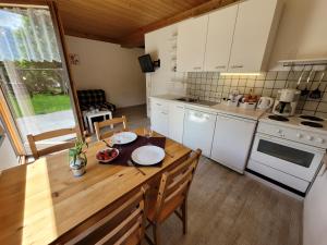 Kuchyň nebo kuchyňský kout v ubytování Profelt`s Apartments Uttendorf - Steinbock Lodges