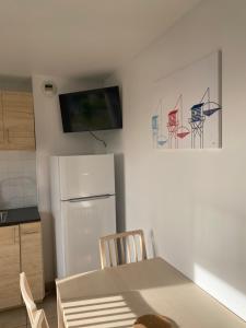 Kuchyňa alebo kuchynka v ubytovaní Résidence Fort de l'Eve - T2 à 380m plage M Hulot et commerces - St Marc sur Mer idéal famille proche La Baule P0rnichet - Terrasse et parking privés