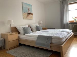 Ένα ή περισσότερα κρεβάτια σε δωμάτιο στο Ferienwohnung Panorama