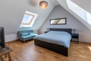 Posteľ alebo postele v izbe v ubytovaní Superbe maison avec piscine et jacuzzi dans les dunes + 20 fotografií