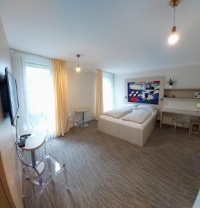 Posteľ alebo postele v izbe v ubytovaní Smarthotel Nezvalova Archa