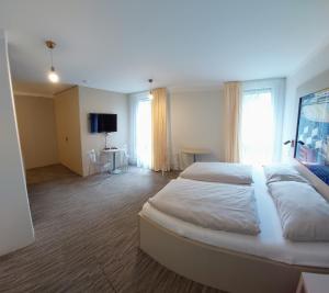Posteľ alebo postele v izbe v ubytovaní Smarthotel Nezvalova Archa