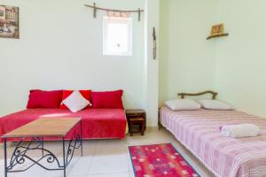 Postel nebo postele na pokoji v ubytování Yoga & Apartment Zlata Oliva