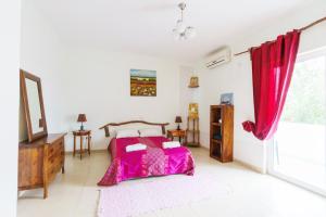 Postel nebo postele na pokoji v ubytování Yoga & Apartment Zlata Oliva