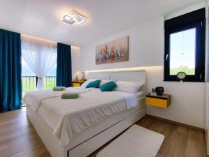 Кровать или кровати в номере Villa Biser Gacke