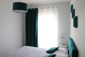 Katil atau katil-katil dalam bilik di Turkusowa Liwia