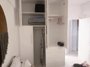 a small room with white walls and white shelves at Casa Di Penny 2 in Kyparissia +45 photos
