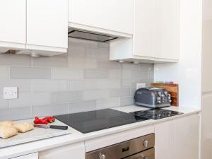 Kuchyň nebo kuchyňský kout v ubytování Ocean Watch 5 + 9 fotografií