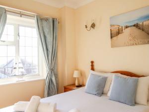 Postel nebo postele na pokoji v ubytování Ocean Watch 5