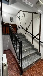 a staircase in a house with a stair case at El Palaero in La Alberca
