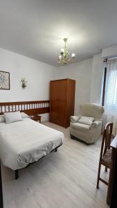 Ένα ή περισσότερα κρεβάτια σε δωμάτιο στο El Palaero