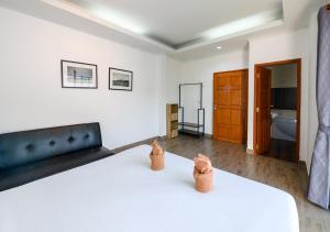 Postel nebo postele na pokoji v ubytování Room@Gallery Pool Villa