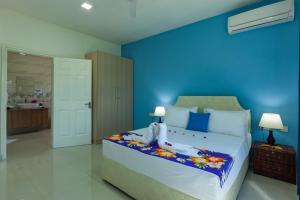 Postel nebo postele na pokoji v ubytování Blue Sky Self Catering