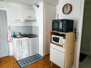 Kuchyň nebo kuchyňský kout v ubytování Place d'Arradon