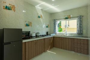 Kuchyň nebo kuchyňský kout v ubytování Blue Sky Self Catering