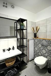 A bathroom at Best Apartman Lelle