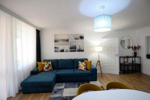 A seating area at Best Apartman Lelle