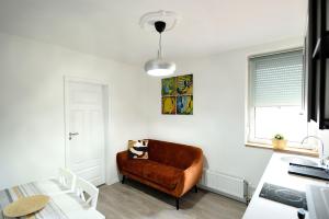 A seating area at Best Apartman Lelle