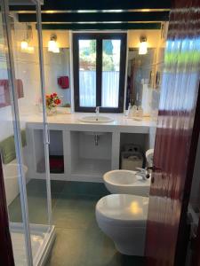 Ett badrum på Studio-Appartment in Landhaus mit Meerblick