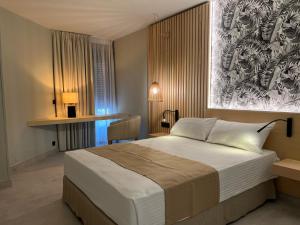 Postel nebo postele na pokoji v ubytování Hotel Noy