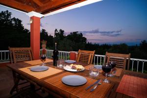 ระเบียงหรือลานระเบียงของ Postatiko Holiday Home Central Corfu
