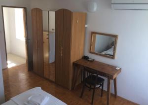 Postel nebo postele na pokoji v ubytování Authentico Deluxe Stari Grad