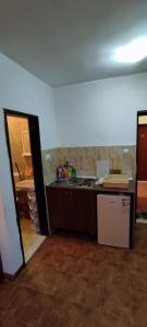 a kitchen with a counter top in a room at Apartman Jasna in Herceg-Novi