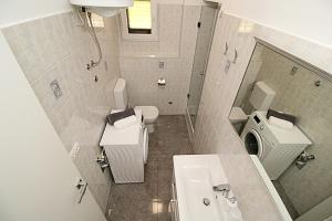 Koupelna v ubytování Apartments Angelo + 27 fotografií