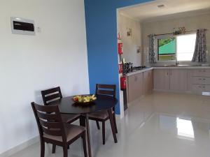 Kuchyň nebo kuchyňský kout v ubytování Blue Sky Self Catering